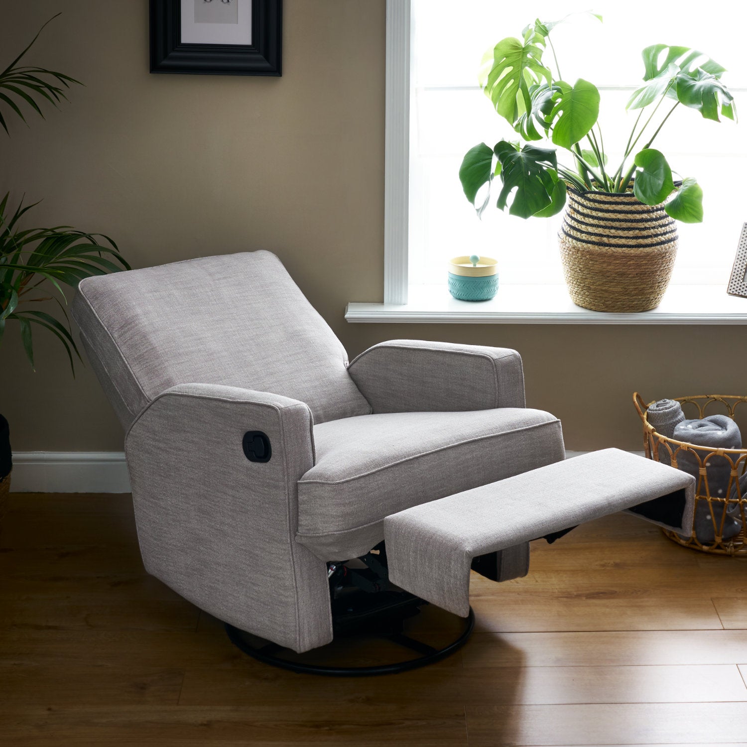 Reclining, Swivel Nursery Chair with extended footrest. 