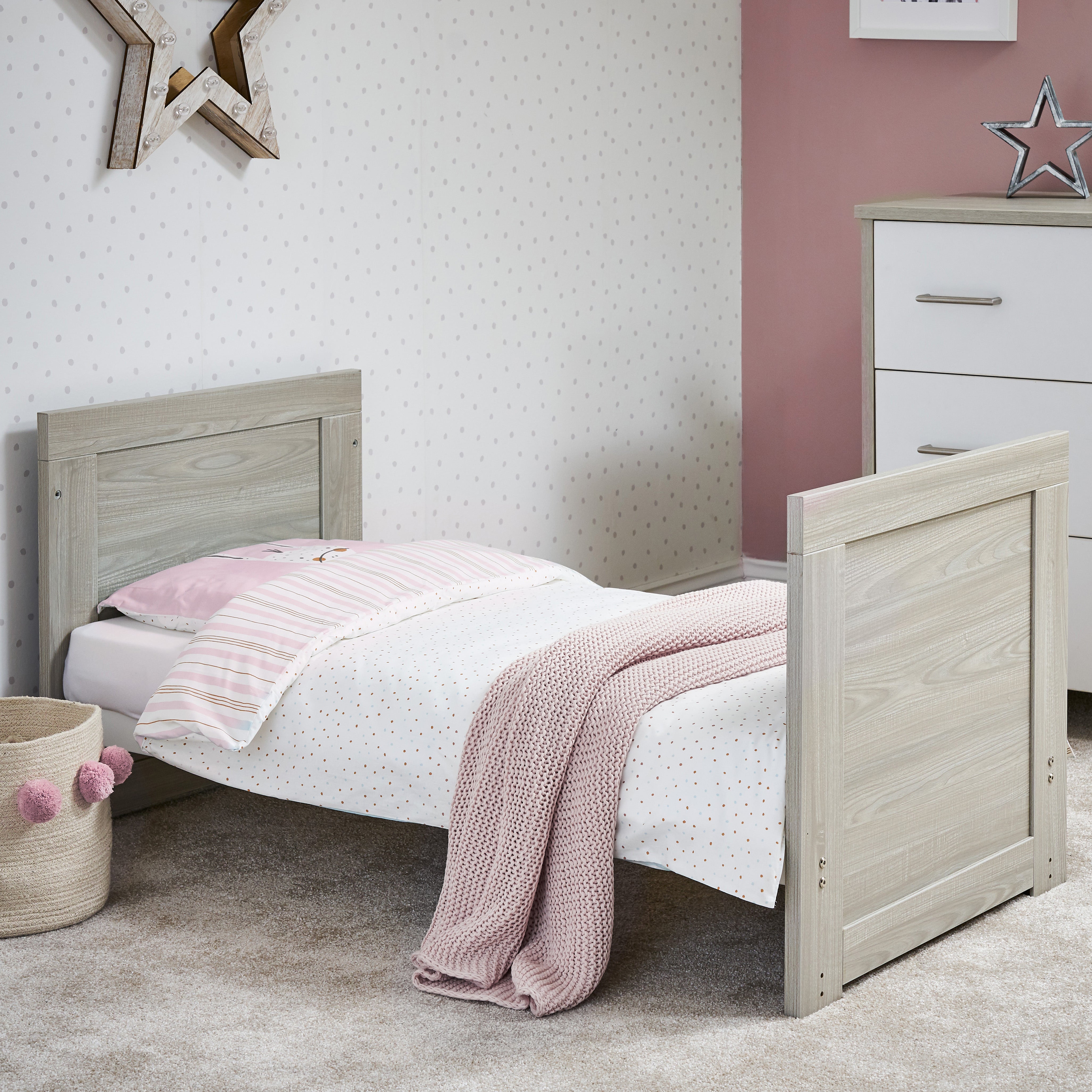 Mini Cot Bed converted into a toddler bed with solid ends 