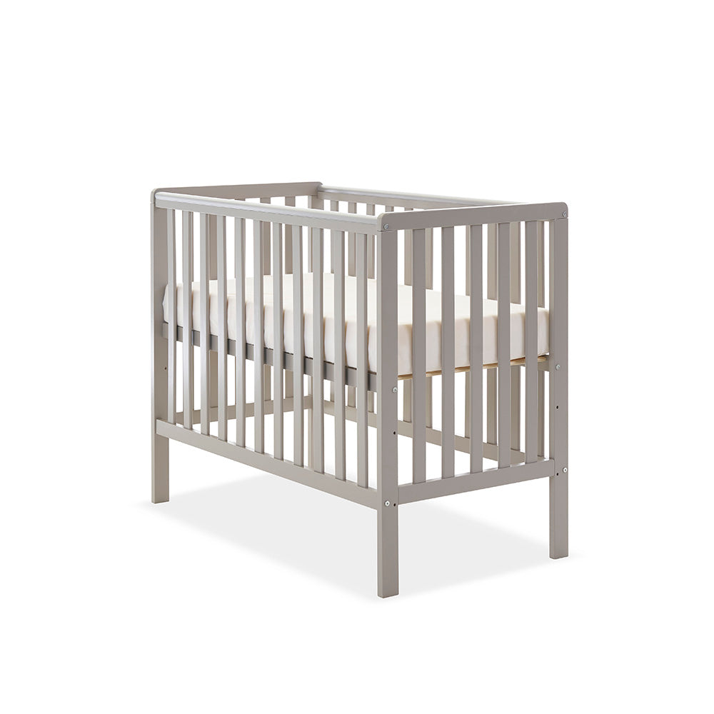 Compact cot with base on the new born level. with rials on all 4 sides. teething rail on 2 sides. 