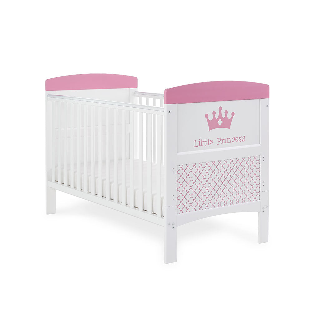 Cot Bed, base on the lowest setting, teething rails on sides, solid ends with printed front & matching pink trim. 