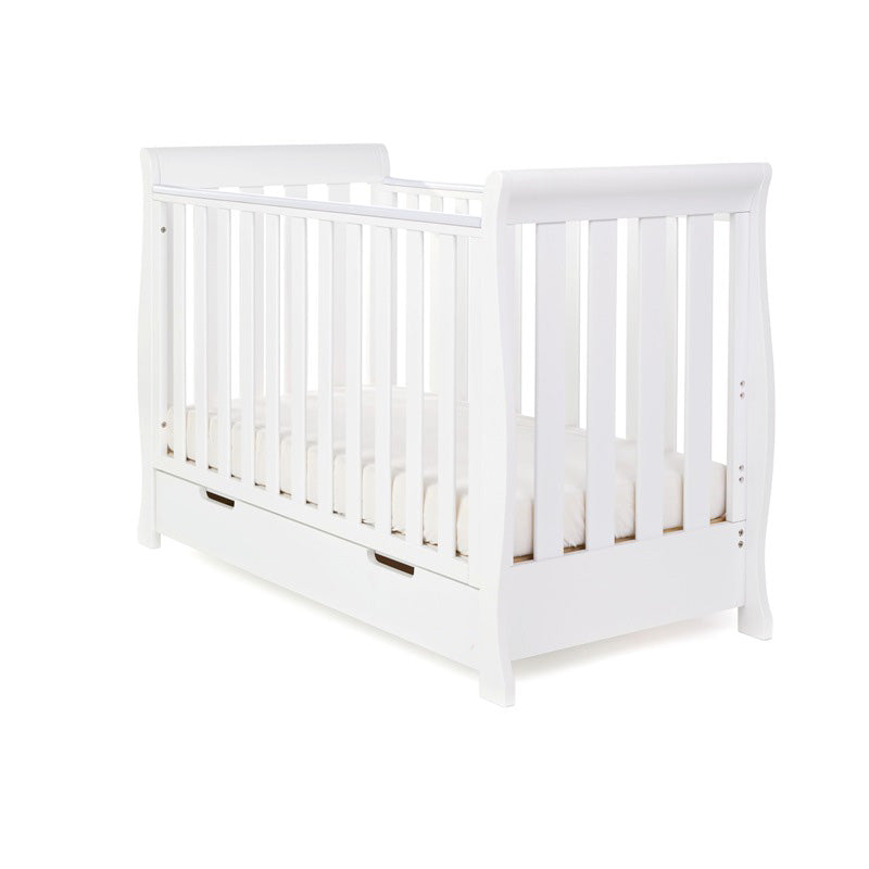 Sleigh Mini Cot Bed, base on the lowest setting with rails on all 4 sides. Under drawer included 